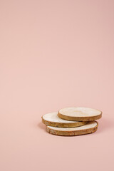 Podium for your product. Advertising banner. Spioa tree on a pink background. Place for text.