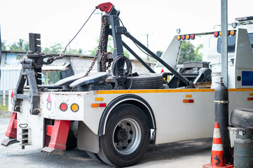 Tow truck delivers the damaged vehicle.