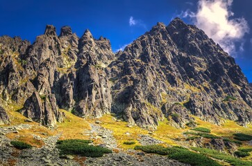 Summer mountain landscape in sunny day. Beautiful mountain rocky peaks in High Tatra, Slovakia.