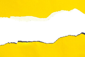 Torn bright paper on a white isolated background, yellow