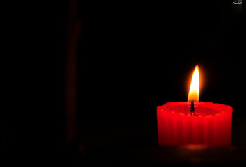 Beautiful Red Candle in the dark.