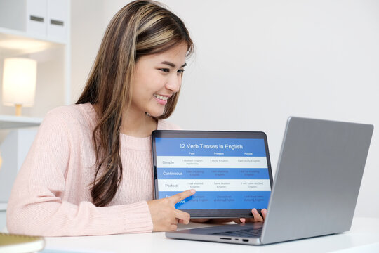 Woman study english language online by laptop computer, learning online course
