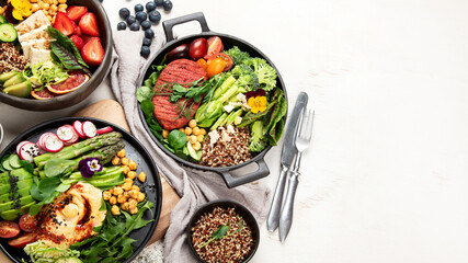 Healthy vegetarian and vegan  salads and Buddha Bowls with vitamins, antioxidants, protein on light...