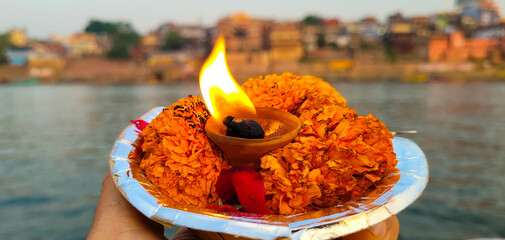 Floating lamp in Ganges river