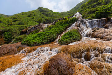 Jinguashi golden waterfall in New Taipei city of Taiwan
