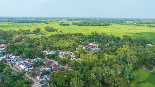 landscape with a field and village , top aerial drone photo