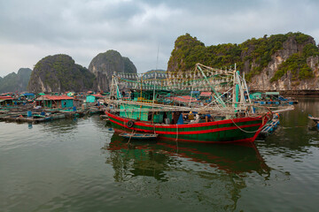 Vietnamese fishing schooner in halong bay, vietnam, southeast asia