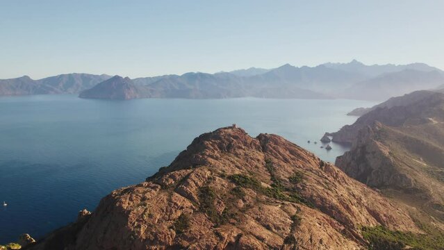 Aerial shot of the Genoese tower at Capo Rosso (Capu Rossu) in Corsica with a 4K drone