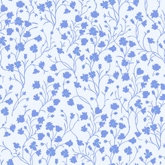 Spring floral pattern of blue purple flowers on a light background.