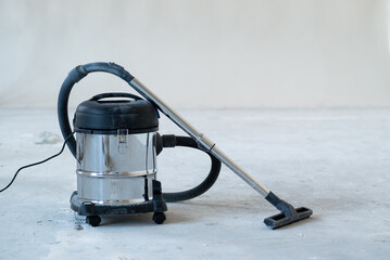 industrial vacuum cleaner at new house construction site, wide banner photo, space for text....