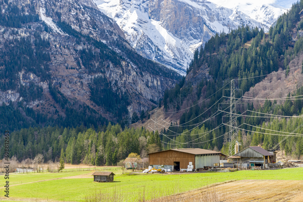 Wall mural farm view in kandersteg, swizerland. on 2 april, 2023.