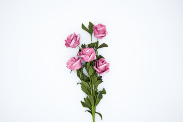 Fototapeta premium A bouquet of artificial roses for decoration