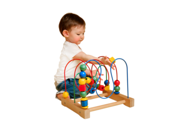 Toddler baby is playing logic educational games on a studio isolated on a white background. Happy child play with educational toy, learning logic, copy space. Kid aged one year and four months