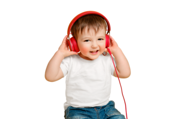 Toddler baby listens to music in red headphones on a studio isolated on a white background. Happy child in a white t-shirt listens to music in wired earphones. Kid aged one year and four months
