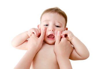 The mother smears the face of the toddler baby boy with cosmetic cream, isolated on a white background. Mom hands apply cream to the child skin, isolated on a white background. Kid aged one year
