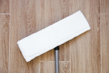 New mop with white clean rag
