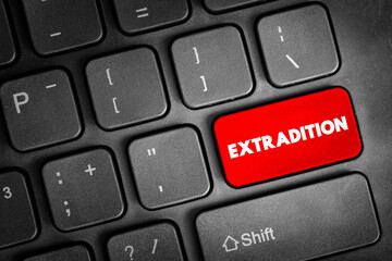 Extradition - action wherein one jurisdiction delivers a person accused or convicted of committing a crime in another jurisdiction, text concept button on keyboard