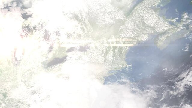 Earth zoom in from outer space to city. Zooming on Utica, New York, USA. The animation continues by zoom out through clouds and atmosphere into space. Images from NASA