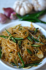 soy sauce seasoned vermicelli noodles with sliced green chilies. Vermicelli are fine noodles made from starch. spicy vermicelli. sohun pedas. Indonesian food. 