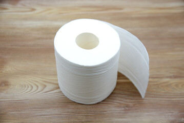 A roll of toilet paper on the table