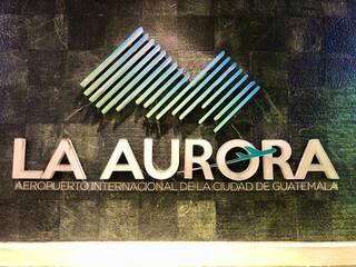 Signage at La Aurora international airport
