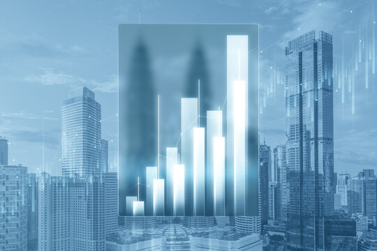 Abstract growing business chart tablet outline on blurry city backdrop. Trade, finance and investment concept. Double exposure. © Who is Danny