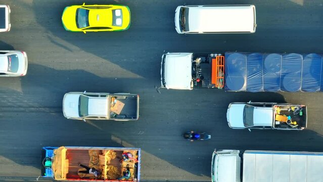 In congested conditions, traffic can form long queues, with vehicles moving in a stop-and-go pattern. This can be frustrating for drivers and may lead to delays and frustration. Vehicle concept. Drone