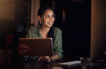 The harder I work, the more luck I seem to have. a young businesswoman using a digital tablet in an...