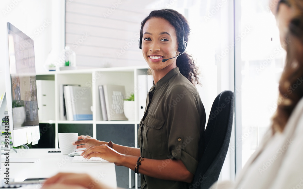 Poster Creating happy clients one call at a time. a young woman using a computer and headset in a modern office.