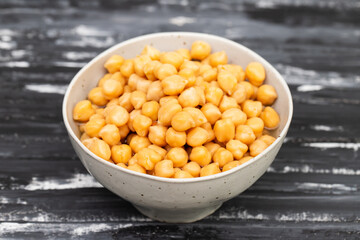 Ceramic bowl full of chickpeas, boiled and drained