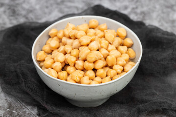 Ceramic bowl full of chickpeas, boiled and drained
