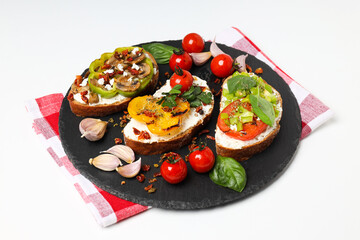 Toasts with tasty grilled vegetables, concept of delicious appetizer