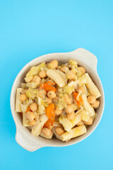 Cooked chick peas with cabbage, carrot in bowl