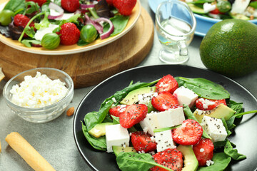 Concept of tasty food, salad with strawberry