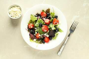 Concept of tasty food, salad with strawberry, top view