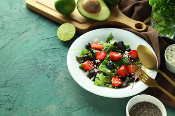 Concept of tasty food, salad with strawberry, space for text