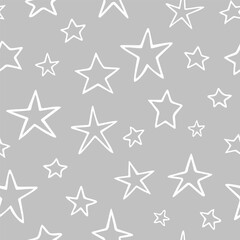 Vector seamless pattern with cute stars. Hand drawn, doodle style. Design for fabric, wrapping, stationery, wallpaper, textile.