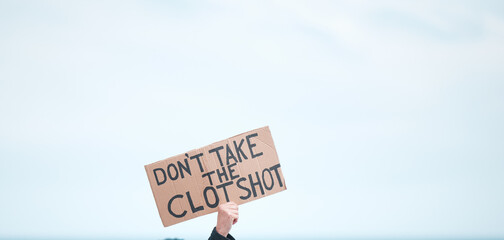 Why is there no information about the vaccine. Cape Town, South African - October 2, 2021 Unrecognisable demonstrators holding up signs and protesting against the Covid 19 vaccine.