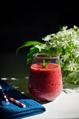 Fresh Berry Smoothie, Paper Straws and Star of Bethlehem Flowers in vase
