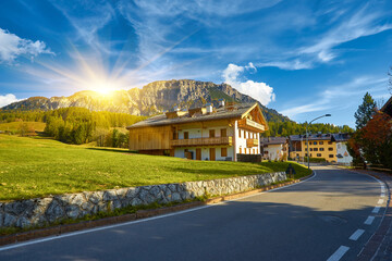 Scenic mountain road in alpine valley, Dolomites Mountains, Italy