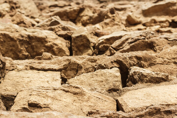 Stones of the old destroyed brickwork of the bridge