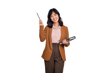 Happy young asian business woman holding notepad and pointing pencil up isolated on white background