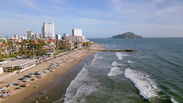 Mazatlan beaches tropical drone video in spring summer on a sunny day and tourists bathing