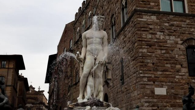 The Fountain of Neptune in the Piazza della Signoria in the center of the city of Florence.