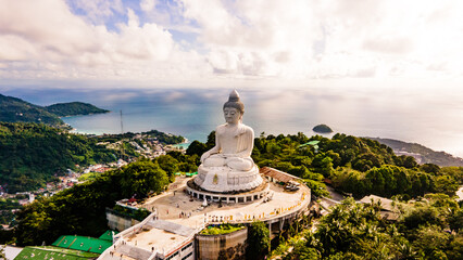 afternoon light sky and blue ocean are on the back of Phuket Big Buddha statue.white Phuket big Buddha is the one of landmarks on Phuket island Thailand. - obrazy, fototapety, plakaty