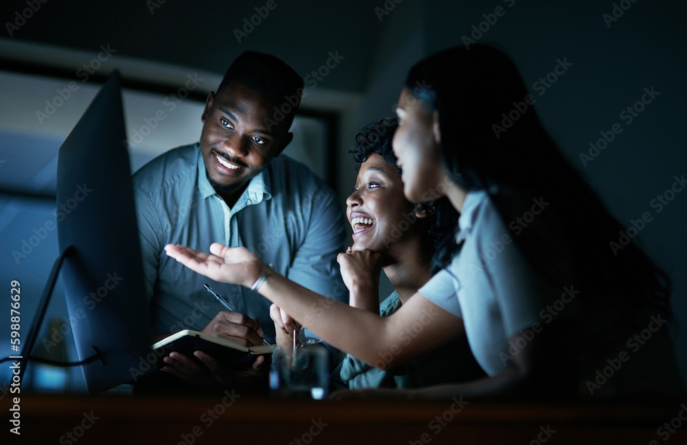 Poster dedication is always well rewarded. a group of young businesspeople using a computer together during