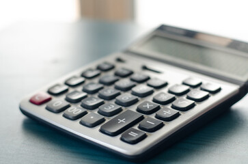 Money and calculator in growing money concept.