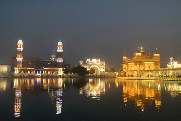 Fototapeta na wymiar The Golden Temple lit at night, Amritsar