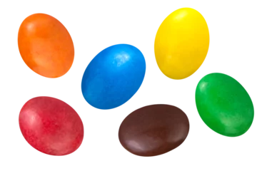 Poster Multicolored glazed dragee isolated on transparent background. © Olexandra