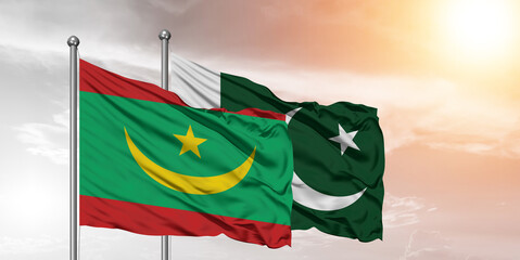 Flags of Pakistan and Mauritania friendship flag waving on the sky with beautiful Background.
